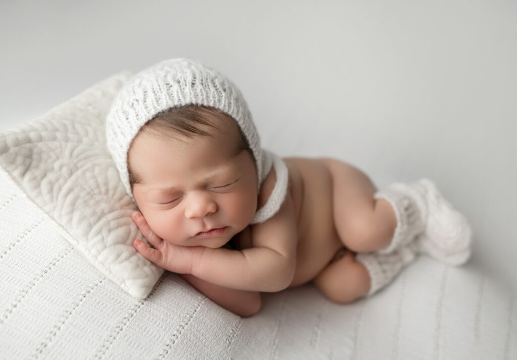 Tiny knit socks on babies